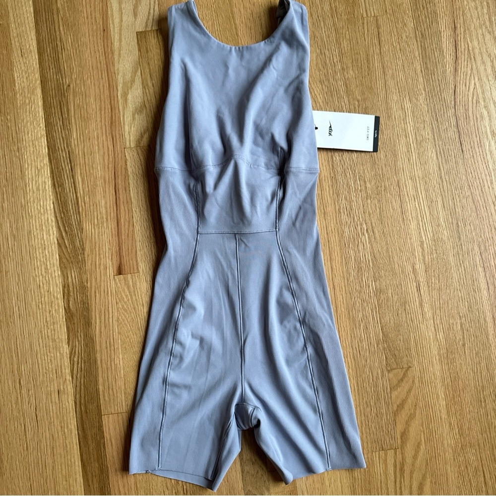 NWT $115 Womens XS Nike Yoga Dri-Fit Luxe 5" Jumpsuit DX1725-519 Purplish Gray